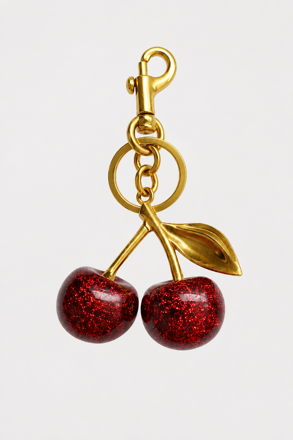 Cherry | Charm de bolso elegante en aspecto dorado